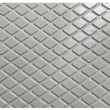 Diamond design rubber landing tile with raised diamond pattern shown as a continuous field across a stair landing