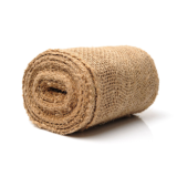 Roll of natural tan woven herringbone coco coir matting, partly unrolled