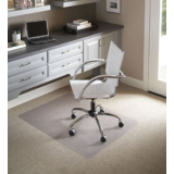 Clear studded vinyl desk chair mat on office carpet, showing the textured rolling surface for a desk chair