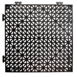 Blue recycled vinyl Cushion Tile with a waffle-grid surface on a wet floor