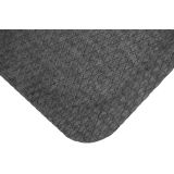 Fabric-top cushioned anti-fatigue kitchen mat in a neutral color at a prep counter