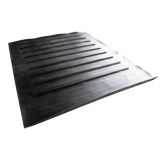 Rubber horse trailer ramp mat with raised ribs for traction and safe loading.