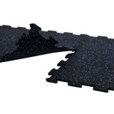 Interlocking rubber gym floor tiles with speckled surface designed for secure fit and durable workout flooring.
