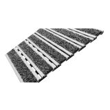 Recessed rubber-hinged walk-off mat seated flush in an entrance floor well