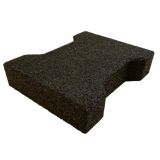 Interlocking dog-bone rubber pavers for horse barn forming a walkway surface outside a horse barn