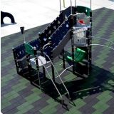 Interlocking rubber playground tiles with color fleck on an outdoor play area