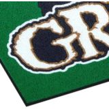 Spaghetti coiled-vinyl logo mat with a custom company logo at an entrance