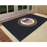 Super Scrape rubber logo mat with a custom molded company logo at a commercial entrance