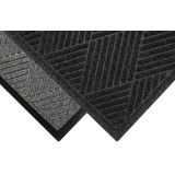 Waterhog Eco Premier entrance mat with a bi-level diamond-pattern surface and water-dam border at a commercial lobby door
